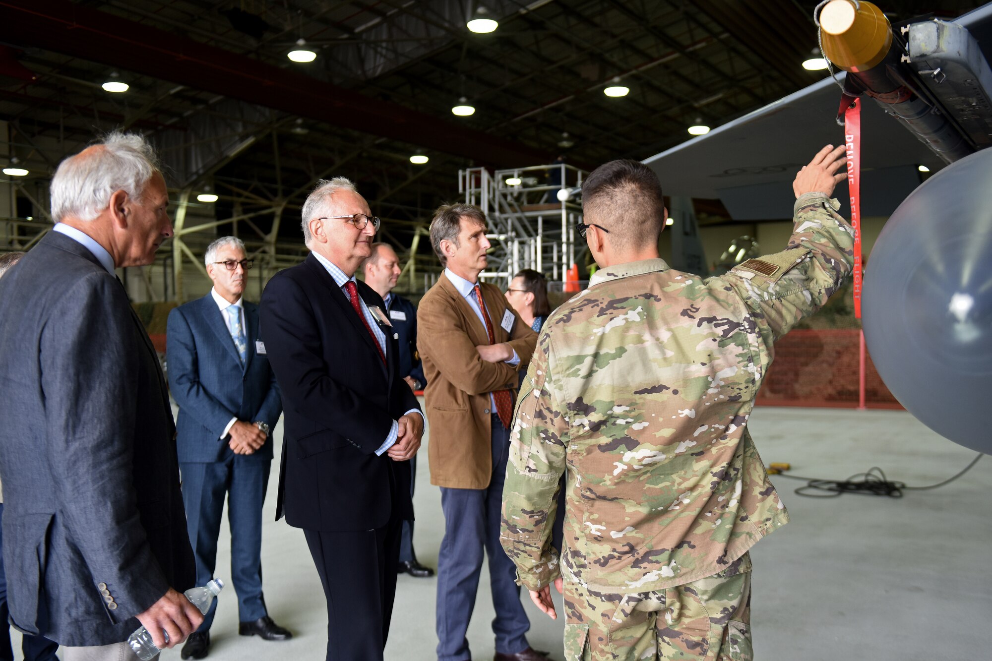 High Sheriffs observe a weapons load team demonstration at Royal Air Force Lakenheath, England, Sept. 6, 2019. High Sheriffs play an increasingly active and supportive role within their counties, both in relation to the police and emergency services and in lending encouragement to public sector agencies. (U.S. Air Force photo by Airman 1st Class Madeline Herzog)
