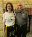 Dr. Victor Convertino (right), U.S. Army Institute of Surgical Research Senior Scientist for Combat Casualty Care Director, Battlefield Health & Trauma Center for Human Integrative Physiology at Joint Base San Antonio-Fort Sam Houston, meets with Sarah Berkheimer in College Station, Texas, last spring, the day after she received her master’s degree from Texas A&M University. For nearly 20 years, Berkheimer and Convertino have maintained a friendship and email correspondence on research Convertino has conducted on treatments for orthostatic intolerance, a rare medical condition that Berkheimer has. The results of their longtime email correspondence have led to Berkheimer being able to utilize devices and treatments that have improved her quality of life and well-being in living with orthostatic intolerance.