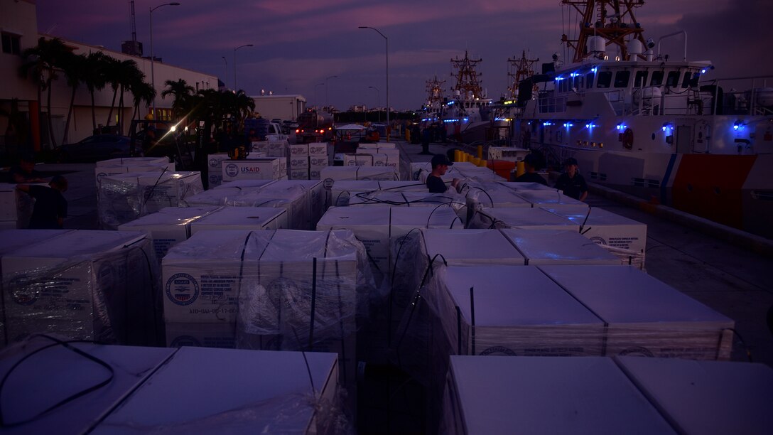 Key West and Miami cutter crews load supplies to take to Bahamas