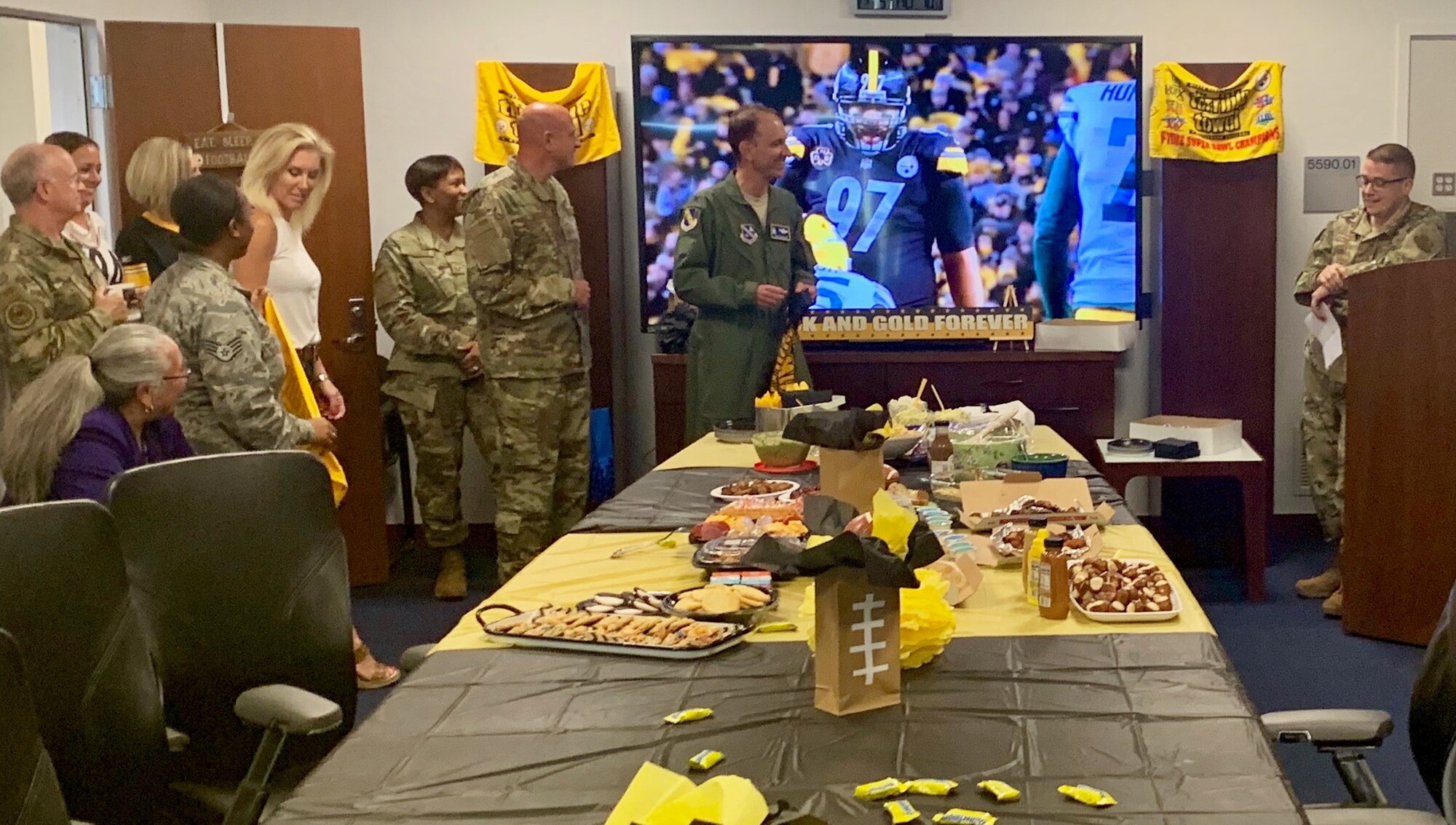 Staffers and family members gathered Sept. 5 for a Pittsburgh Steelers-themed send off at Air Force District of Washington headquarters in honor of outgoing Vice Commander Col. Kevin Eastland.