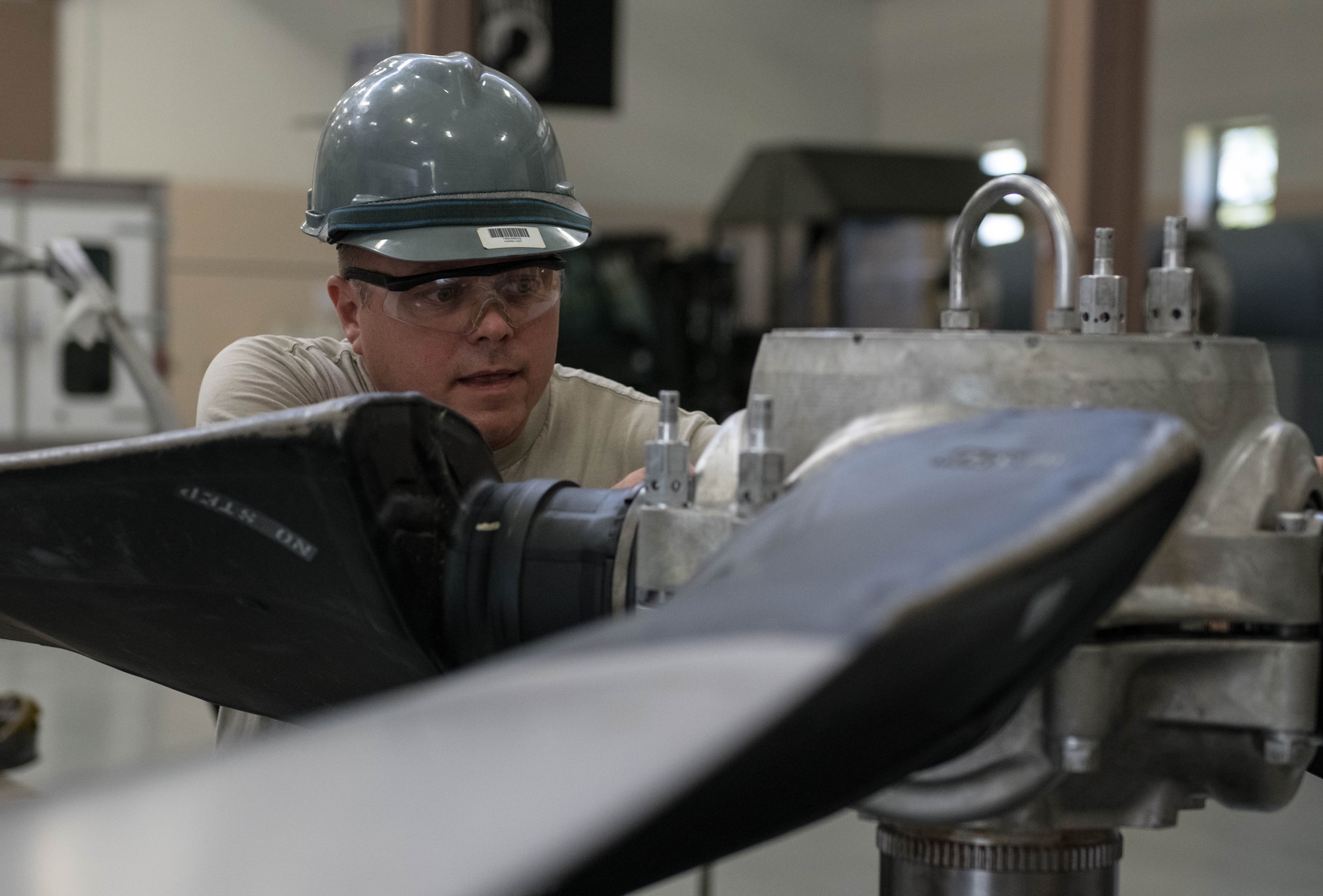 Tech. Sgt. Steve Lew, an aerospace technician assigned to the to the 910th Maintenance Squadron, assembles the hub and blades on test post, Aug. 11, 2019 at Youngstown Air Reserve Station.