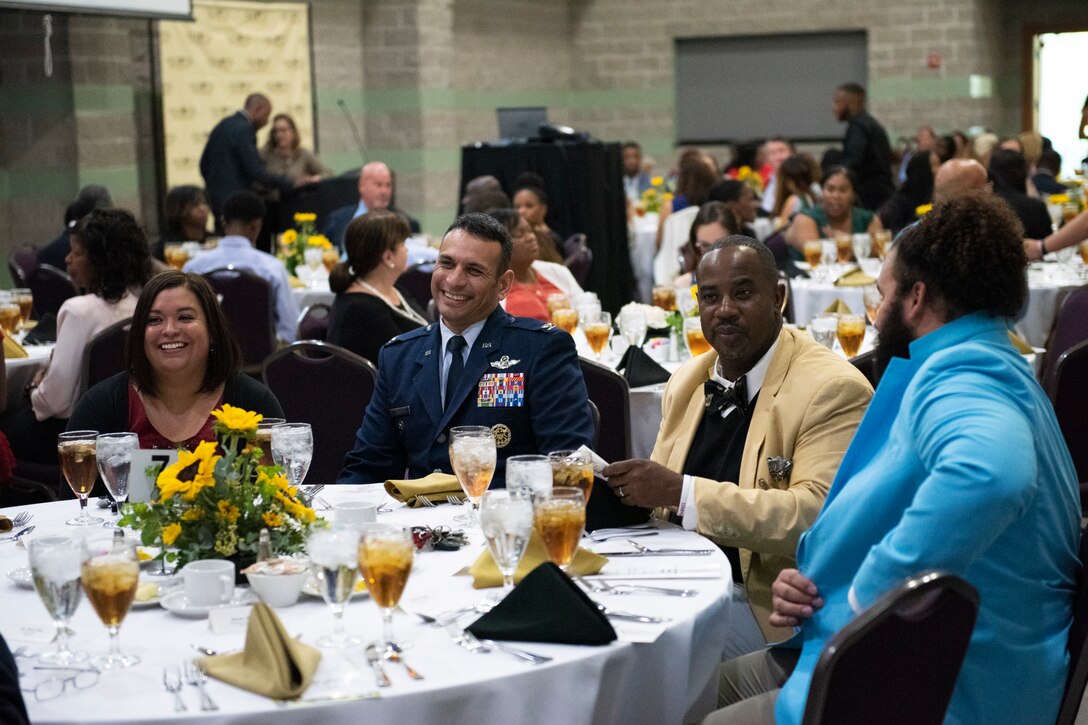 Attendees of the Valdosta City Schools (VCS) 2019 Teacher of the Year Banquet socialize before the event begins, Sept. 5, 2019, at the Rainwater Conference Center, Valdosta, Ga. This year the VCS system named Melvina Murray, Valdosta City Schools (VCS) Teacher of the Year award recipient and Team Moody spouse, as one of two recipients to recognize her hard work and dedication before the Murray family relocates to California mid-September. Murray’s leadership described her as a VCS educator who not only embodies her school’s core expectations of integrity first, respect for yourself and others, and excellence in all we do, but also consistently placed service before herself. (U.S. Air Force photo by 2nd Lt. Kaylin P. Hankerson)