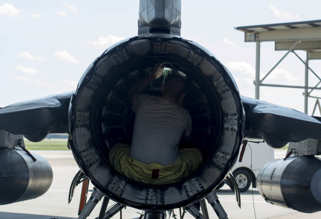 A U.S. Air Force Airman assigned to the 20th Aircraft Maintenance Squadron works on an F-16CM Viper at Shaw Air Force Base, South Carolina, Sept. 6, 2019