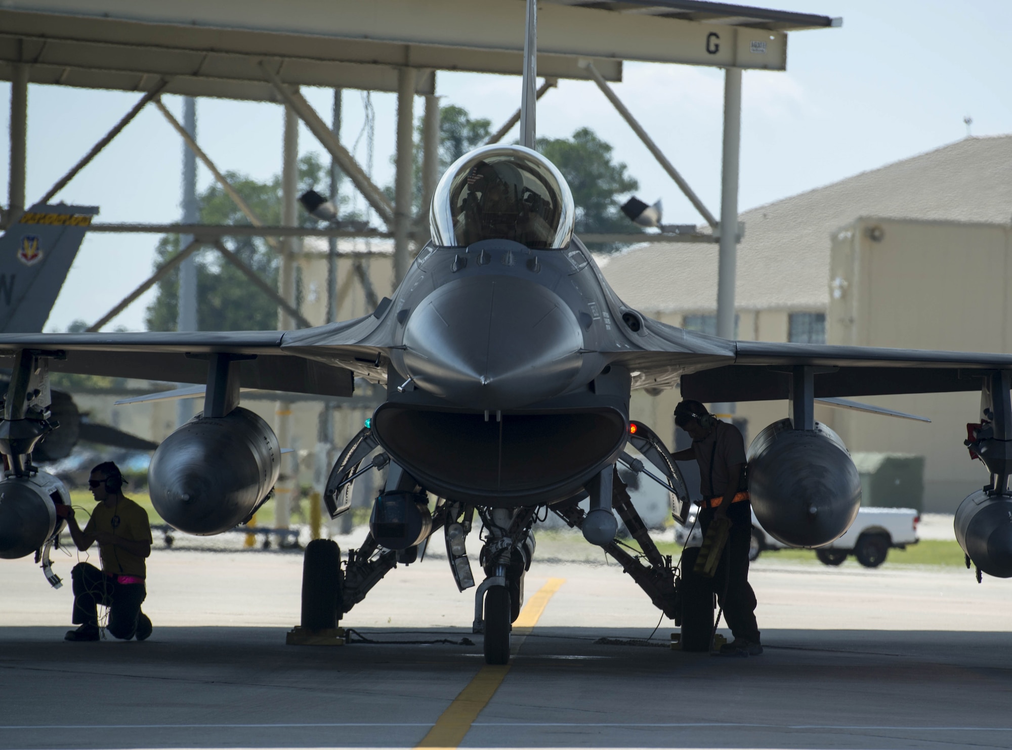 U.S. Air Force Airmen assigned to the 20th Aircraft Maintenance Squadron work on an F-16CM Viper at Shaw Air Force Base, South Carolina, Sept. 6, 2019.