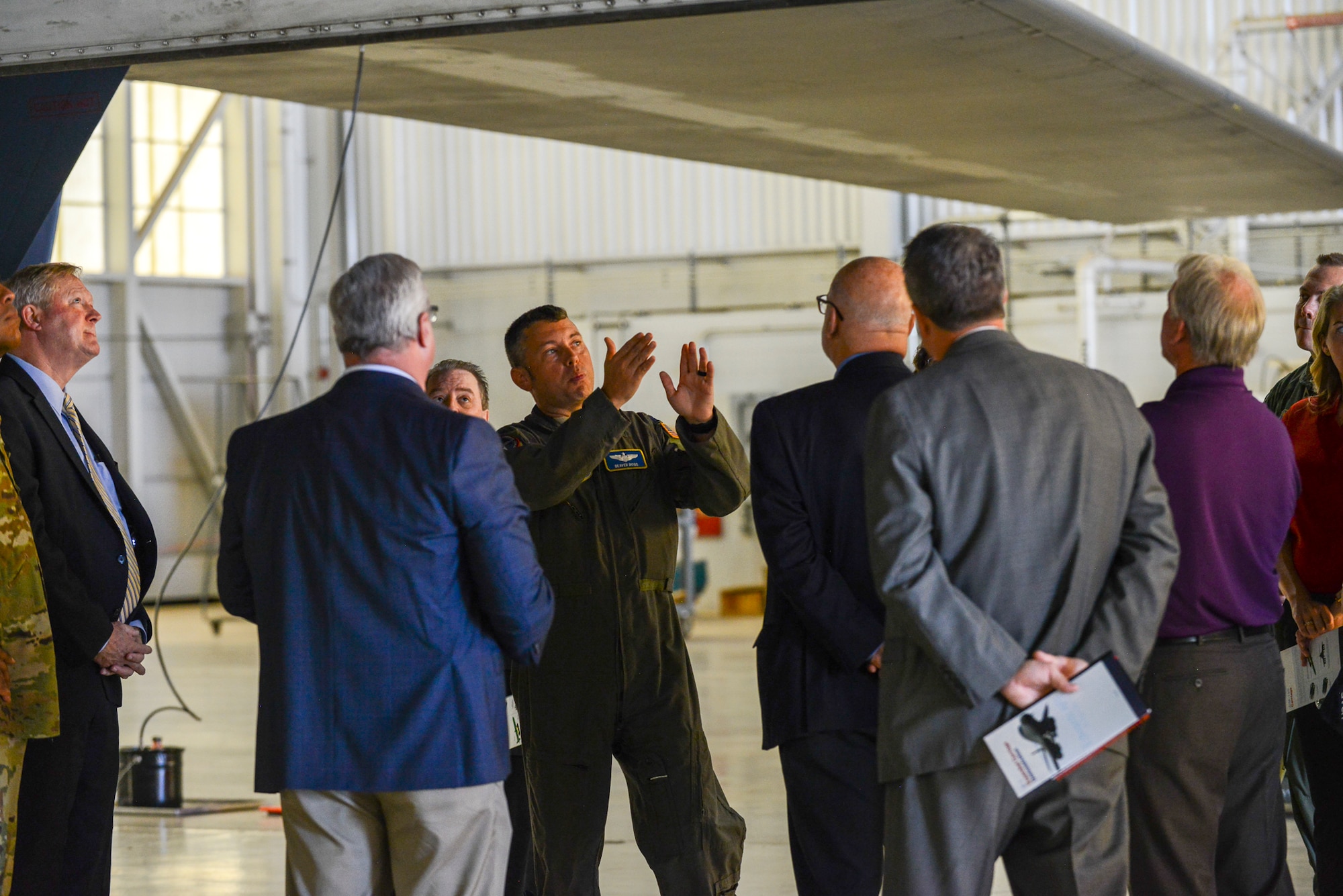 Lt. Col. Dominic Ross, B-1B program element monitor, Air Force Global Strike Command, provides a brief on the B-1B expanded carriage at Edwards Air Force Base, California, Aug. 28. (U.S. Air Force photo by Giancarlo Casem)