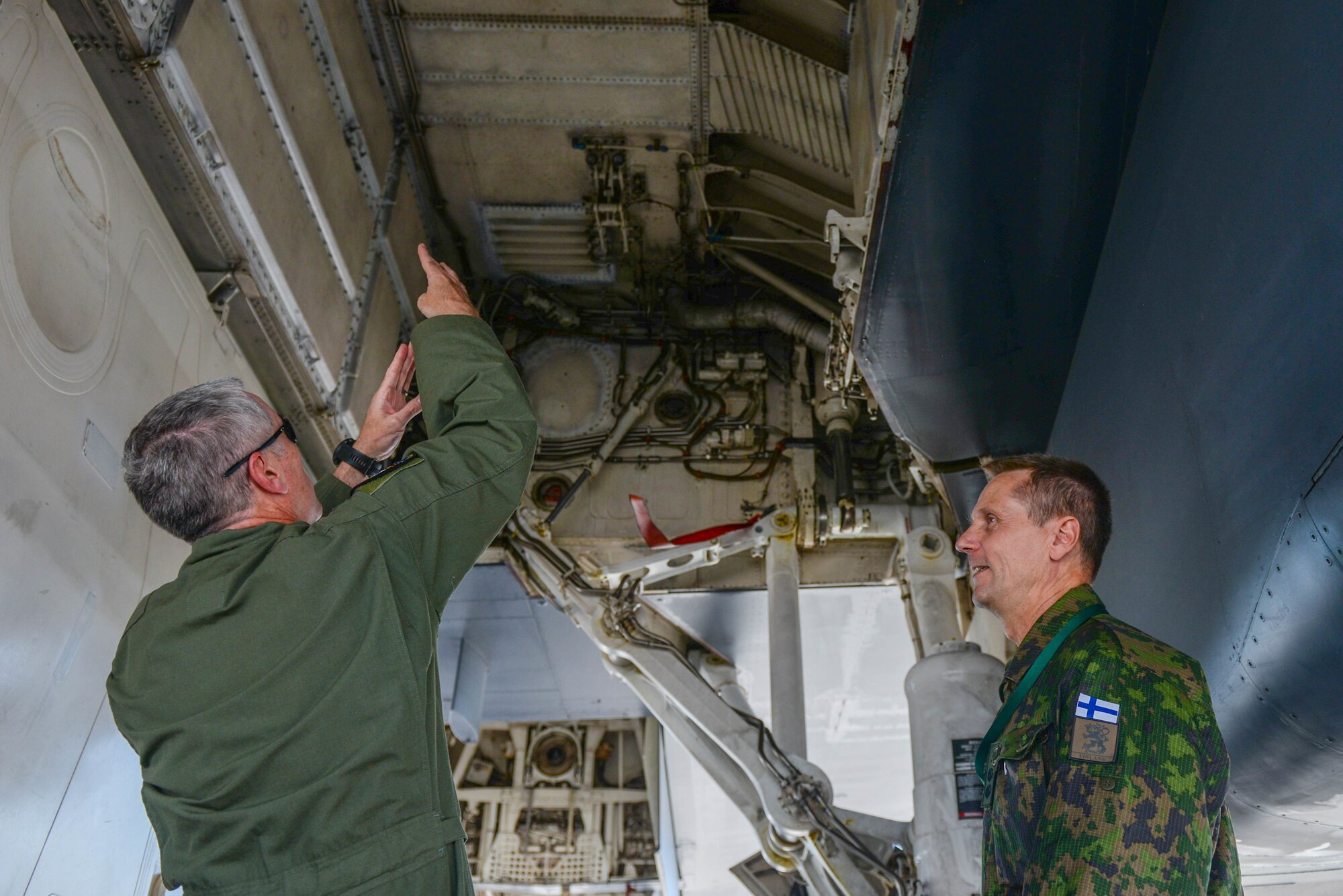 Col. R. Allen Barksdale, the 28th Operations Group commander, points out aspects of the B-1B Lancer to a visiting foreign defense attaché at Ellsworth Air Force Base, S.D., Sept. 4, 2019. Approximately 45 defense attachés from several different countries visited the base to learn more about the mission of the 28th Bomb Wing and the 89th Attack Squadron.  They toured statics of munitions; a B-1, assigned to the 37th Bomb Squadron; and a UH-72 Lakota, which was provided by the South Dakota National Guard. (U.S. Air Force photo by Tech. Sgt. Jette Carr)