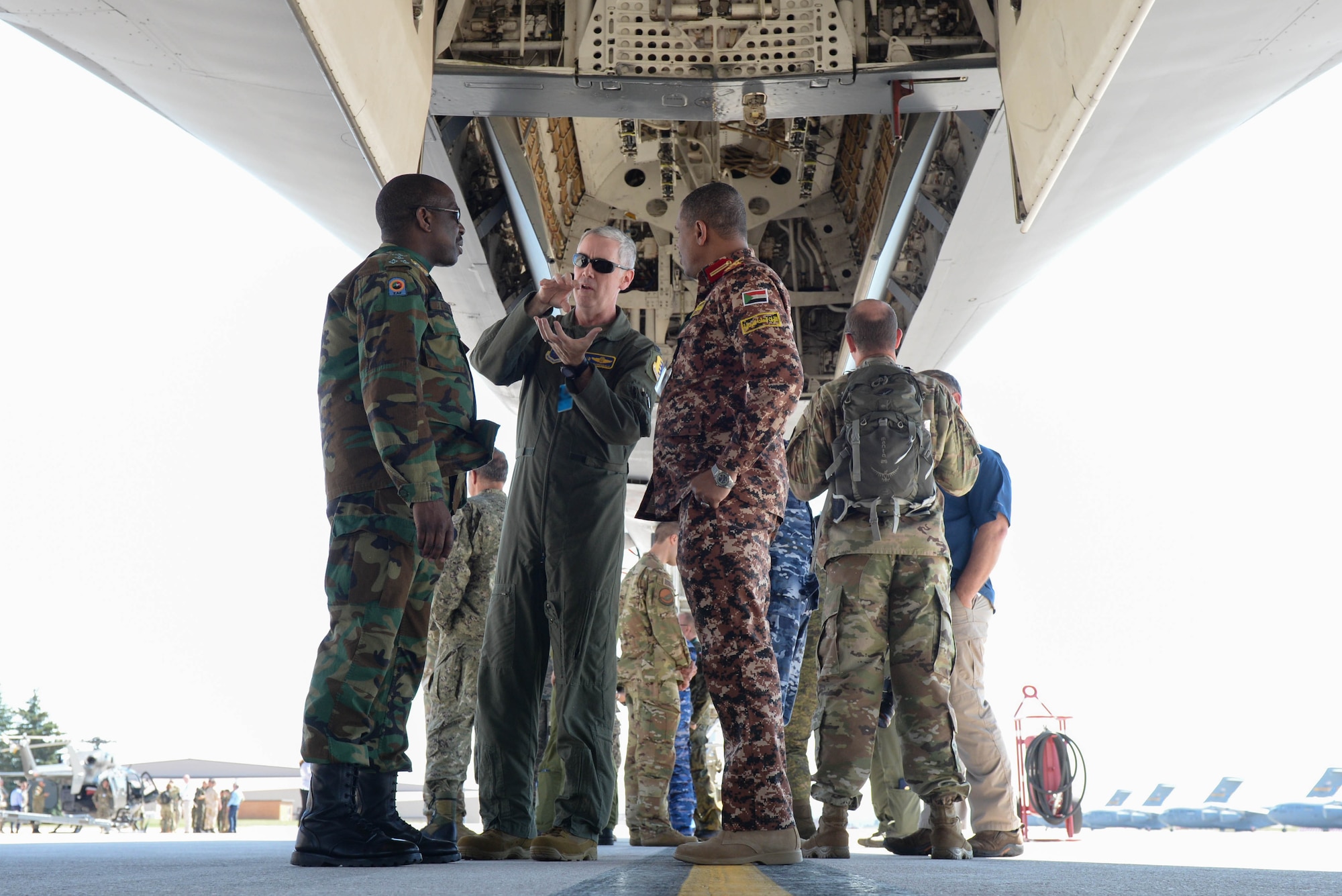 Col. R. Allen Barksdale, the 28th Operations Group commander, converses with foreign defense attachés visiting Ellsworth Air Force Base, S.D., Sept. 4, 2019, to learn more about the mission of the 28th Bomb Wing and the 89th Attack Squadron.  Coming from all over the world, 45 defense attachés toured statics of munitions; a B-1B Lancer, assigned to the 37th Bomb Squadron; and a UH-72 Lakota, which was provided by the South Dakota National Guard. (U.S. Air Force photo by Tech. Sgt. Jette Carr)