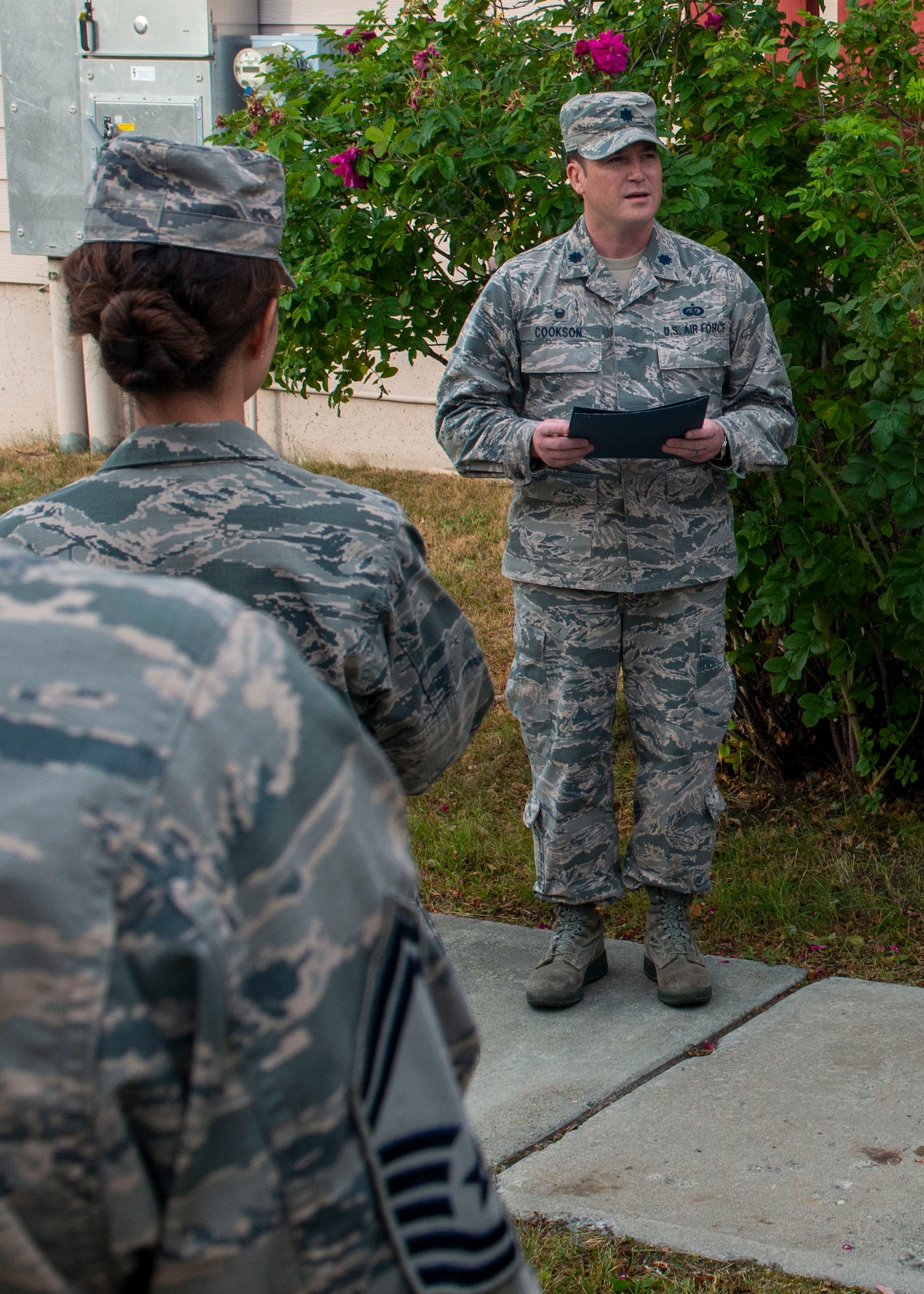 U.S. Air Force Lt. Col. Diamond Cookson, 673d Force Support Squadron commander, speaks during a ribbon cutting ceremony held for new distinguished visitors’ quarters on Joint Base Elmendorf-Richardson, Alaska September 6, 2019. The new quarters are the result of a renovation project consisting of demolishing eight visitors’ quarters on the first floor of the Northern Lights Inn and replacing them with four larger business suites for distinguished visitors.