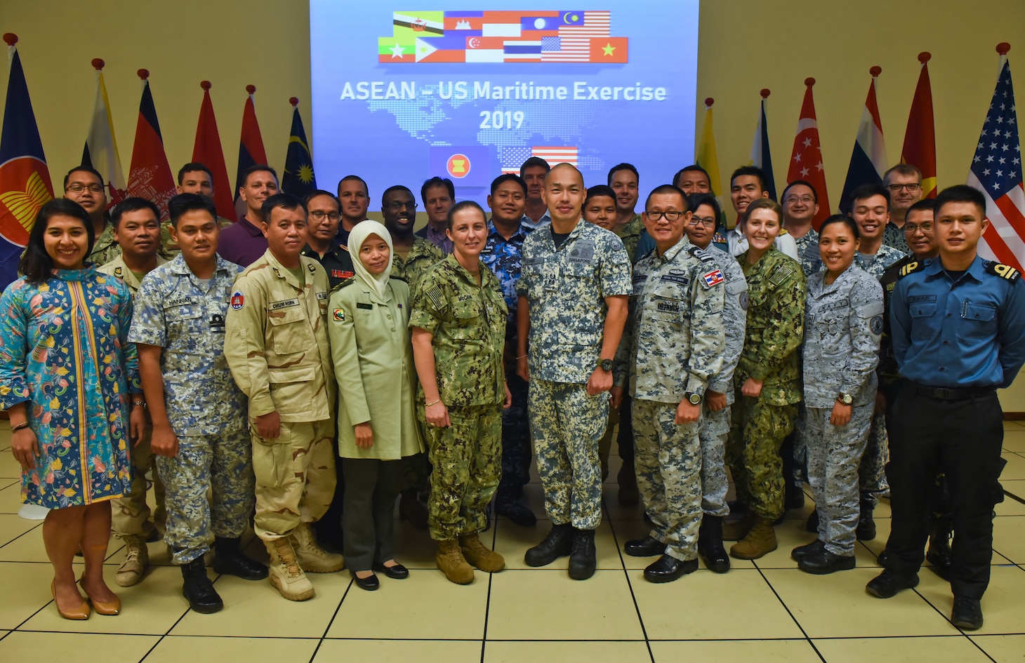 CHANGI NAVAL BASE, Singapore (September 06, 2019) U.S. Navy Sailors and representatives of ASEAN member state maritime forces gather for a photo during the ASEAN-U.S. Maritime Exercise (AUMX). The first ASEAN-U.S. Maritime Exercise, co-led by the U.S. and Royal Thai navies, includes maritime forces from the U.S. and all ten ASEAN member states. AUMX promotes shared commitments to maritime partnerships, security and stability in Southeast Asia.