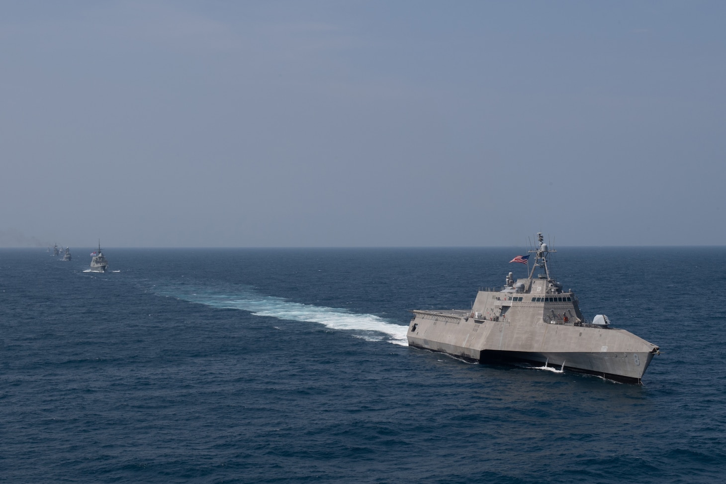 GULF OF THAILAND (Sept. 4, 2019) – USS Montgomery (LCS 8), an Independence-variant littoral combat ship, sails in formation during a photo exercise as part of the ASEAN-U.S. Maritime Exercise (AUMX). The first AUMX, co-led by the U.S. and Royal Thai navies, includes maritime forces from the U.S. and all 10 ASEAN member states. AUMX promotes shared commitments to maritime partnerships, security and stability in Southeast Asia.