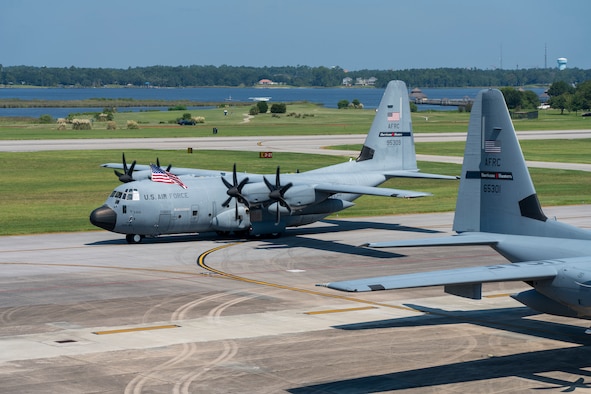 A WC-130J Super Hercules aircraft from the 53rd Weather Reconnaissance Squadron, aka Hurricane Hunters, taxis its way to its parking spot after completing its mission into Hurricane Dorian, Sep. 5, 2019 at Keesler Air Force Base, Mississippi. The Hurricane Hunters, have flown 25 missions in support of Dorian. (U.S. Air Force photo by Tech. Sgt. Christopher Carranza)