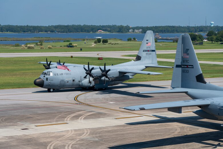 A WC-130J Super Hercules aircraft from the 53rd Weather Reconnaissance Squadron, aka Hurricane Hunters, taxis its way to its parking spot after completing its mission into Hurricane Dorian, Sep. 5, 2019 at Keesler Air Force Base, Mississippi. The Hurricane Hunters, have flown 25 missions in support of Dorian. (U.S. Air Force photo by Tech. Sgt. Christopher Carranza)