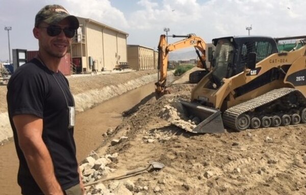 Mr. Jimenez-Vargas reviewing the work on the culvert at Bagram in progress. Vargas is the lead engineer for this project.