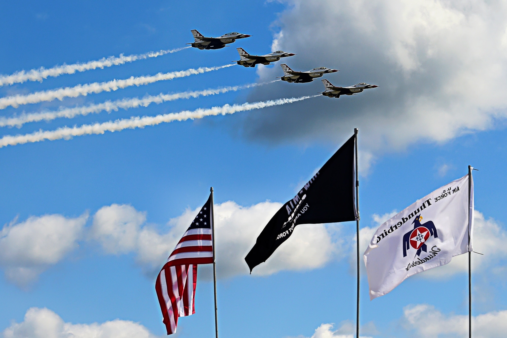 The U.S. Air Force Thunderbirds roar across the Indiana skies during the Grissom Air & Space Expo Sept. 7, 2019. The event drew thousands of spectators, and will continue Sept. 8, 2019 as gates open at 8:30 a.m. with flying starting around 11 a.m. and gates closing at 5 p.m. to the free event. (U.S. Air Force photo/Staff Sgt. Chris Massey)