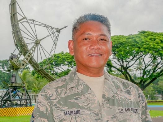 Master Sgt. Eugene Mariano, 298th Support Squadron radar maintenance technician poses for a picture in front of a Philippine Air Force radar monument, Aug. 20, 2019, Clark Air Base, Philippines.