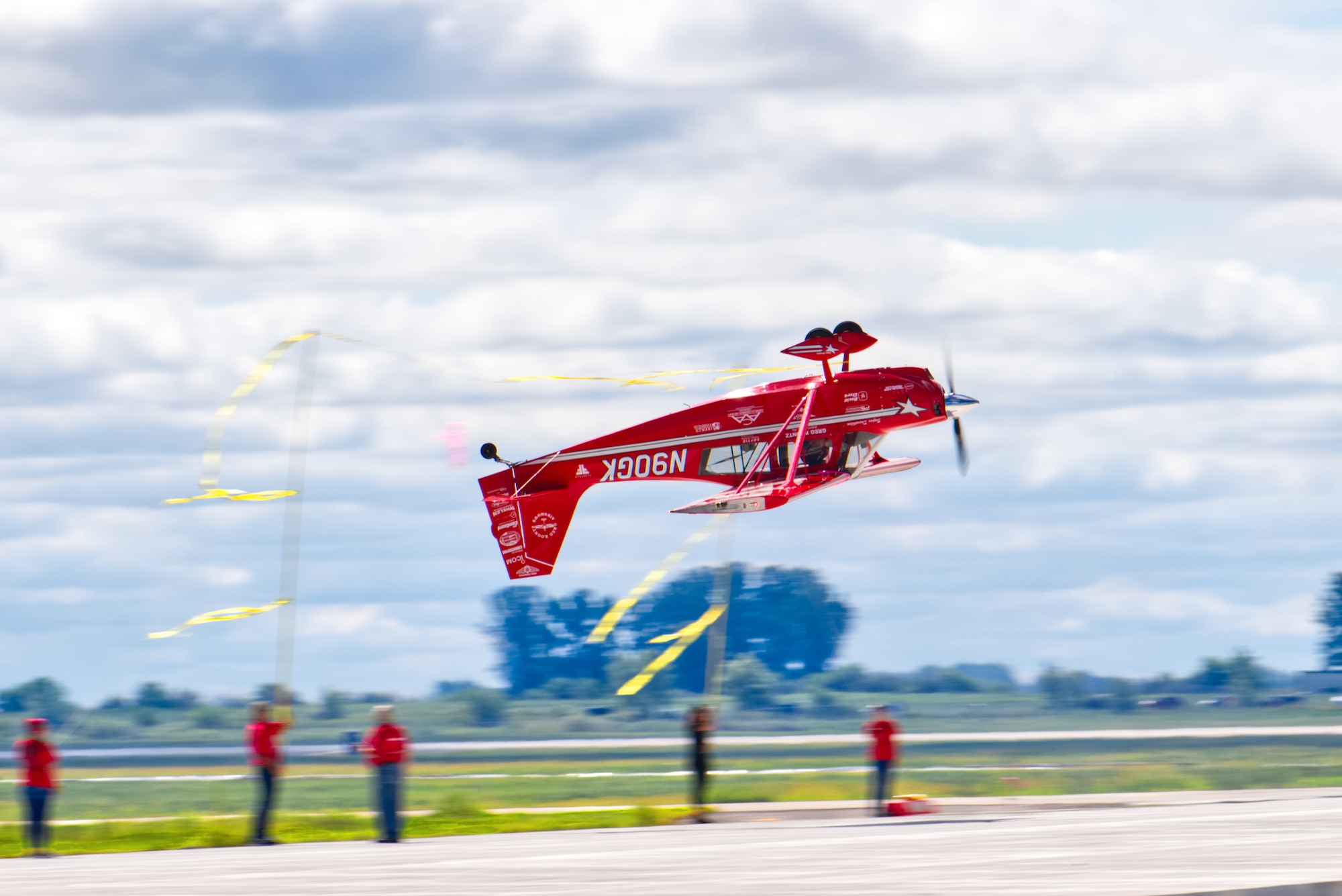 An American Champion 8KCAB Decathlon performs aerial acrobatics in front of an audience at the 2019 Grissom Air & Space Expo. With an estimated crowd of over 50,000, it was Grissom's first air show in over 15 years.