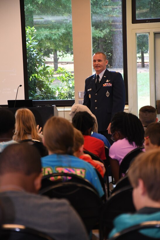 Maj. Benjamin Calhoon, 22nd Air Force executive officer, shares his Air Force experiences to middle school youth at Rock Eagle 4-H Center in Eatonton, Ga., Aug 17, 2019. Maj. Calhoon served as capnote speaker for the event and shared opportunities for STEM related careers in the Air Force.