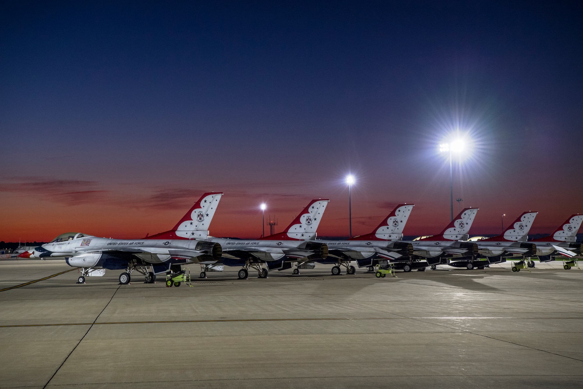 The U.S. Air Force premier demonstration squadron “Thunderbirds” sit on Grissom’s parking ramp prior to the kick-off of the Grissom Air & Space Expo Sept. 7, 2019. The airshow brought in more than 50,000 spectators the first day alone and featured several civilian and military aircraft. (U.S. Air Force photo/Master Sgt. Benjamin Mota)