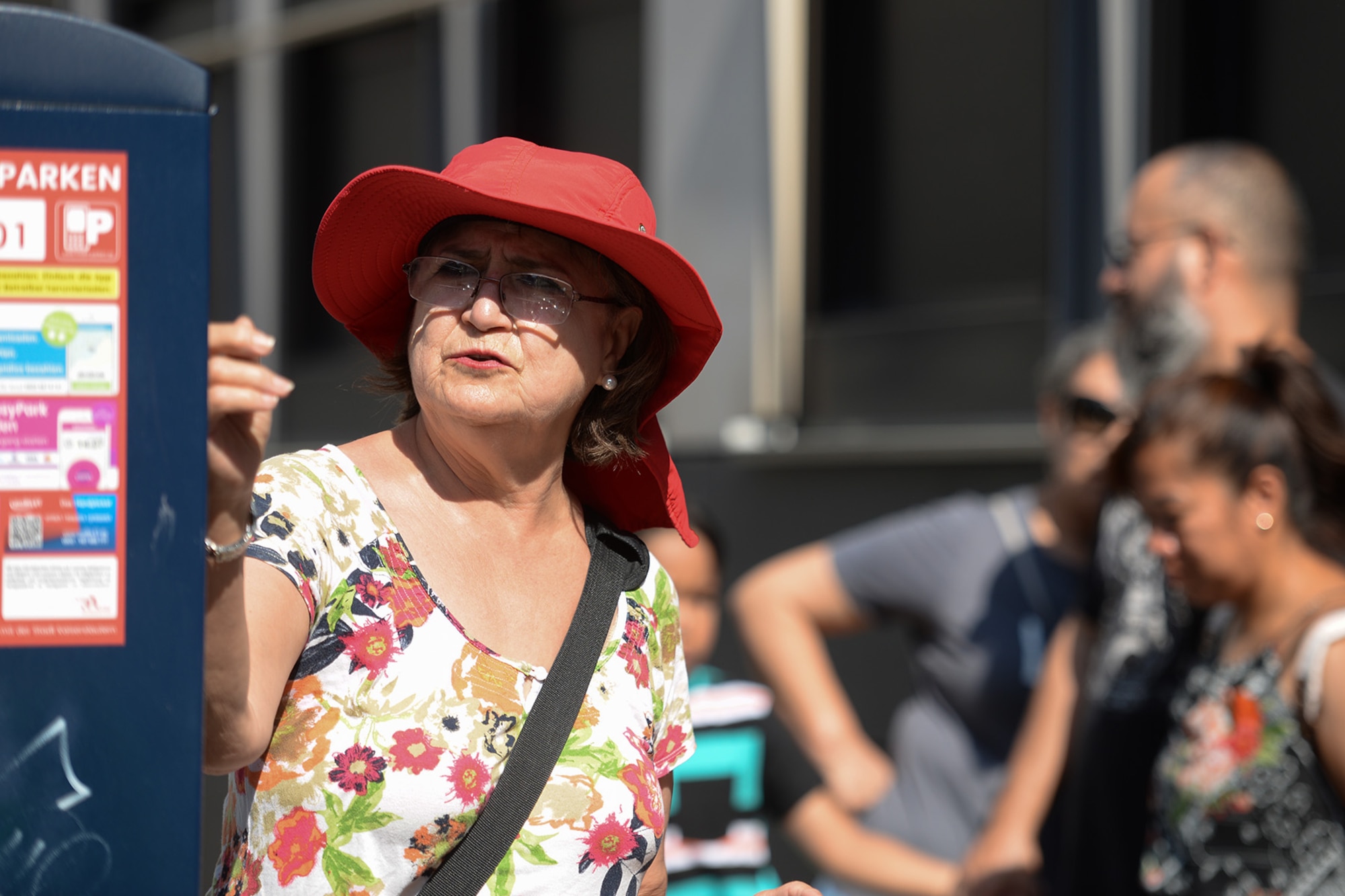 Mary Laureana Aguirre-Garza, a tour guide, teaches Ramstein Air Base Newcomers Tour attendees about German parking etiquette in Kaiserslautern, Germany, June 27, 2019. Aguirre-Garza has been showcasing Germany for two years.