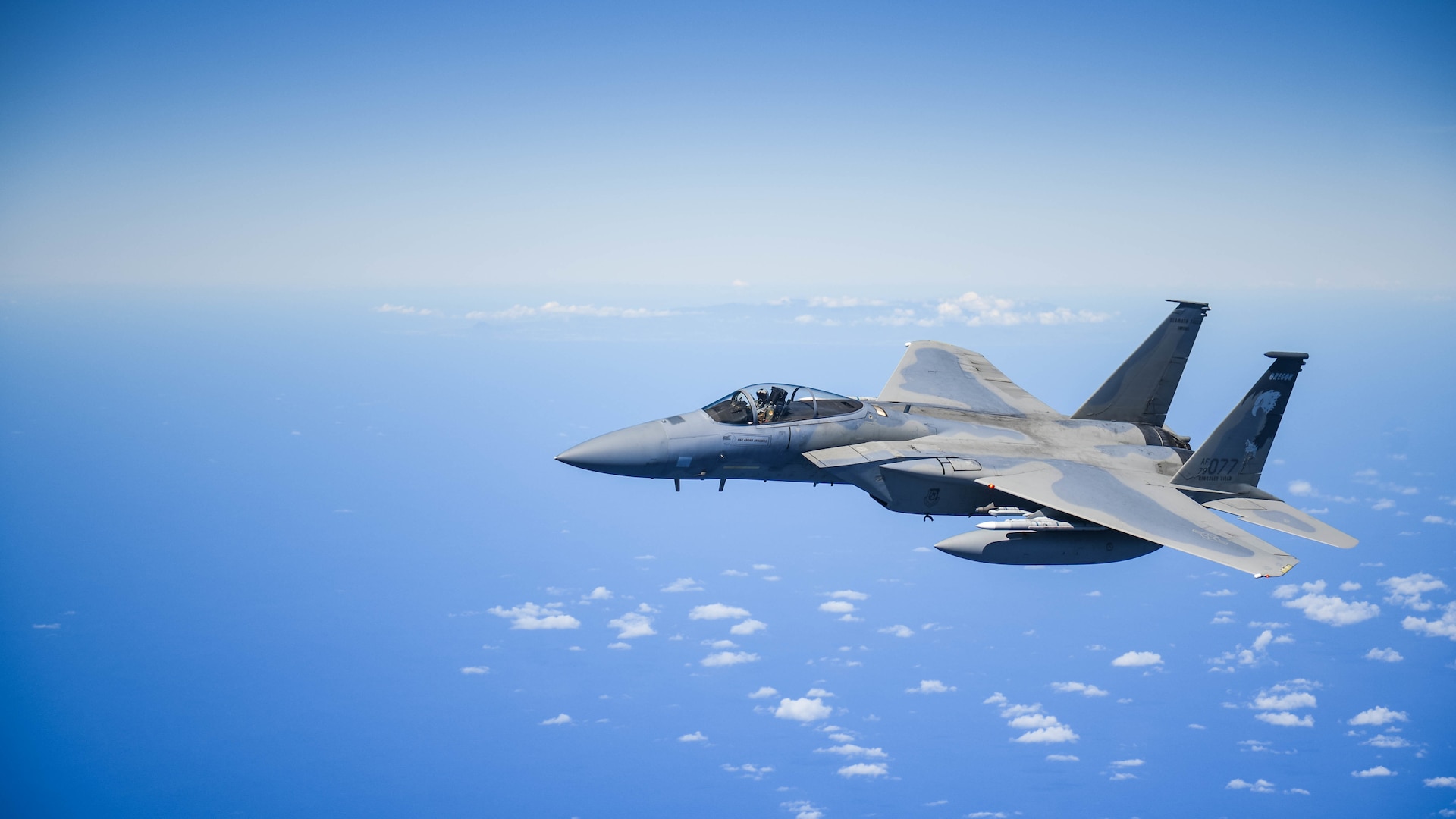 A United States Air Force F-15 Eagle from the 173rd Fighter Wing out of Kingsley Field in Klamath Falls, Oregon, flies over the Pacific Ocean during the Sentry Aloha exercise at Joint Base Pearl Harbor-Hickam, August 27, 2019.