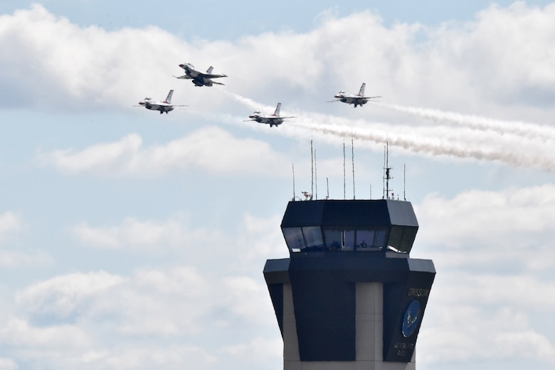The U.S. Air Force Thunderbirds fly past Grissom’s air traffic control tower during the Grissom Air & Space Expo, Sept. 7, 2019. The two-day event drew a crowd of more than 50,000 spectators and was the first airshow the base has held since 2003. (U.S. Air Force photo/Tech. Sgt. Jami Lancette)