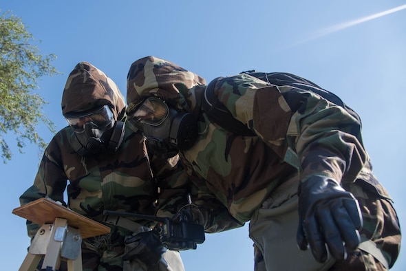 Master Sgt. Stephen Thomas, 22nd Logistics Readiness Squadron fuels information services center section chief, reviews the chemical, biological, radiological and nuclear commander’s battle book Sept. 5, 2019, at McConnell Air Force Base, Kan. Thomas was one of the three team leaders during the group’s CBRN defense training who helped lead training groups. (U.S. Air Force photo by Airman 1st Class Marc A. Garcia)