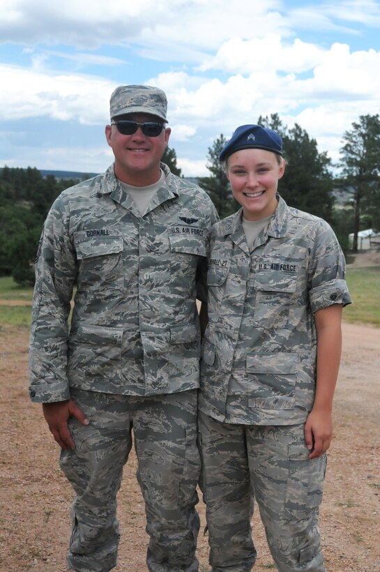 Cadet 3rd Class Kaura Gornall is currently a junior at the U.S. Air Force Academy, poses with her father, Senior Master Sgt. John Gornall, a medical technician with the 445th Aeromedical Staging Squadron. Senior Master Sgt. Gornall was happy to be able to complete his annual tour at the Air Force Academy in Colorado Springs where he could see Kaura in action.