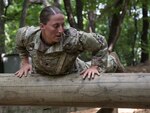 Sgt. Danielle Martin negotiates an obstacle during the 1-134th Cavalry Squadron's spur ride during annual training in the Republic of Korea June 17, 2019.