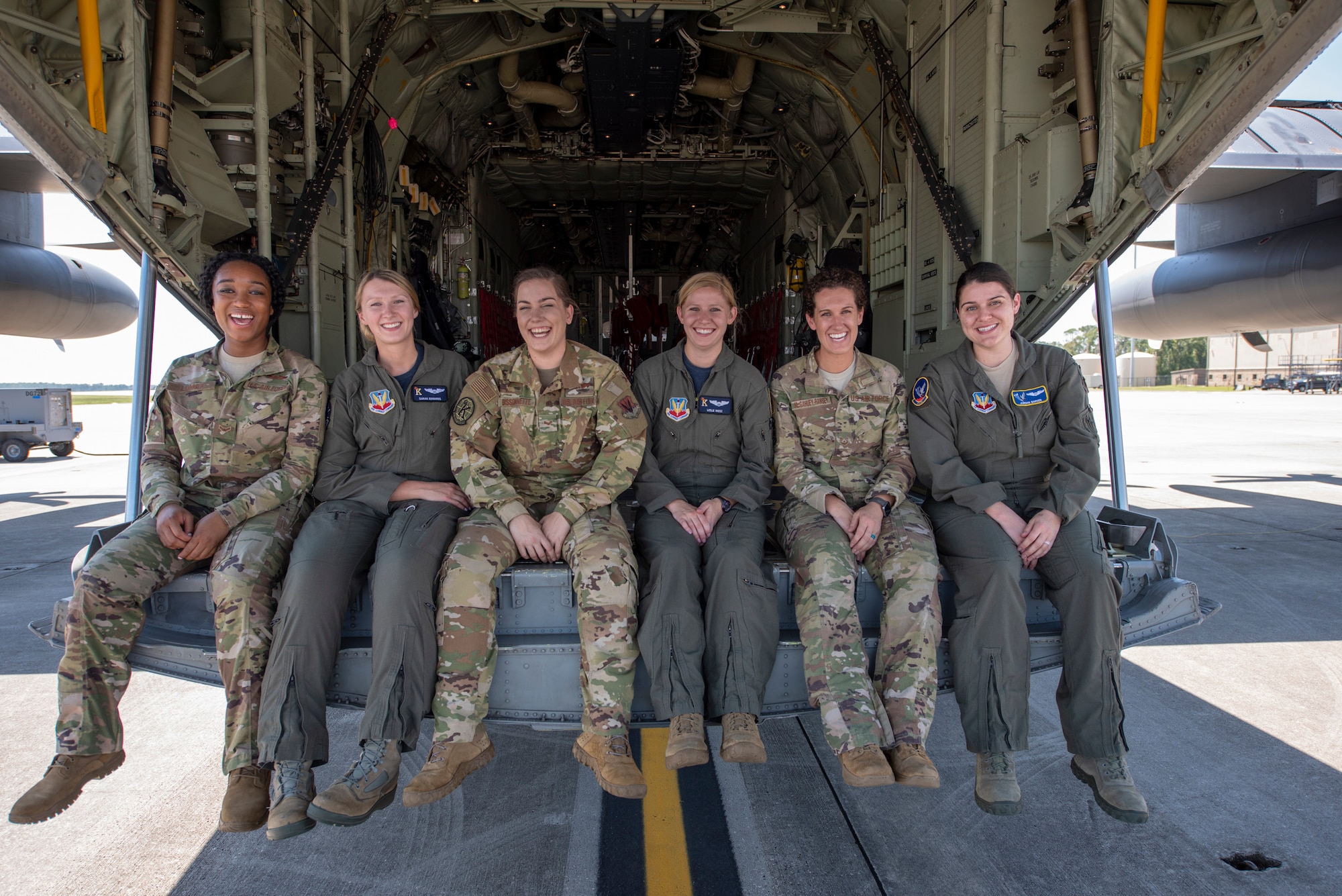 Airmen with the 347th Rescue Group pose for a photo after completing the HC-130J Combat King II’s first flight to be operated by an all-female aircrew Sept. 6, 2019, at Moody Air Force Base, Ga. From left to right: Airman 1st Class Jazmyne Lomax, Capt. Sarah Edwards, Senior Airman Rachel Bissonnette, Capt. Leslie Weisz, Tech. Sgt. Colleen McGahuey-Ramsey, and Capt. Jordan Barden. (U.S. Air Force photo by 2nd Lt. Kaylin P. Hankerson