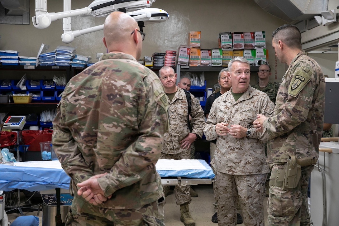 U.S. Marine Corps Gen. Kenneth F. McKenzie, the commander of U.S. Central Command, speaks with a U.S. Soldier assigned to Train Advise Assist Command – East during his visit in Jalalabad, Afghanistan, Sept. 9, 2019. (U.S. Marine Corps photo by Sgt. Roderick Jacquote)