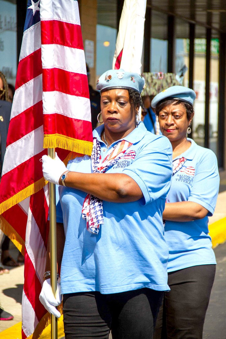 Members of National Women Veterans United present the colors at the dedication ceremony for the Sgt. Simone A. Robinson Women Veteran’s Center on Sept. 7