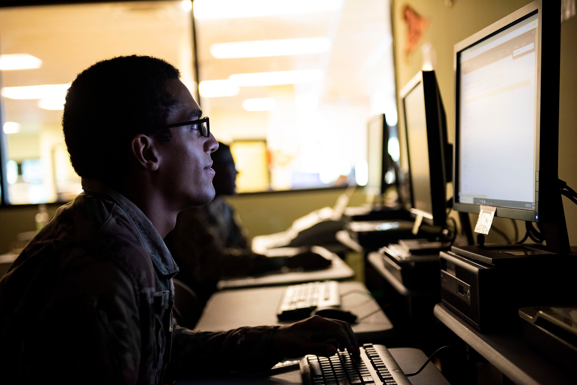 Airman 1st Class Michael Southerly, 823d Base Defense Squadron fireteam member, performs computer-based training Sept. 5, 2019, at Moody Air Force Base, Ga. The education center at the information Learning Center equips Airmen with the tools they need to further their education, be it finishing their Community College of the Air Force degree or continuing higher education. (U.S. Air Force photo by Senior Airman Erick Requadt)