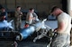 A 432nd Maintenance Group Airman checks his technical orders at Creech Air Force Base, Nevada, July 19, 2019. The first load competition was held at MacDill Air Force Base, Florida, March 1958. (U.S. Air Force photo by Airman 1st Class William Rio Rosado)