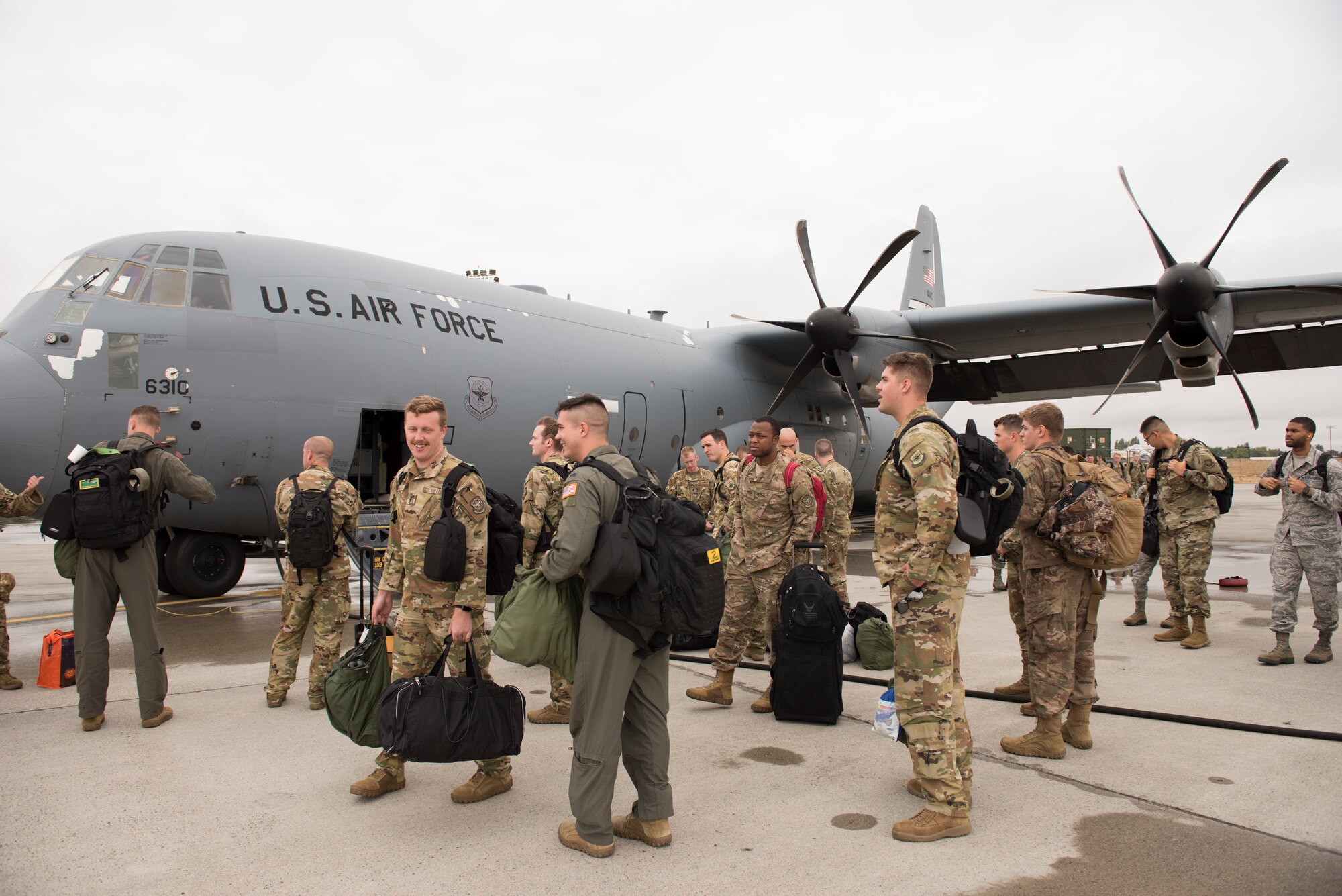 Airmen from Little Rock Air Force Base, Arkansas, disembark a C-130 Hercules for Air Mobility Command’s Mobility Guardian 2019 exercise at Fairchild Air Force Base, Washington, Sept. 8, 2019. Exercise Mobility Guardian is AMC’s premier, large-scale mobility exercise designed to build joint leaders and strengthen international partnerships and interoperability. (U.S. Air Force photo by Senior Airman Ryan Lackey)