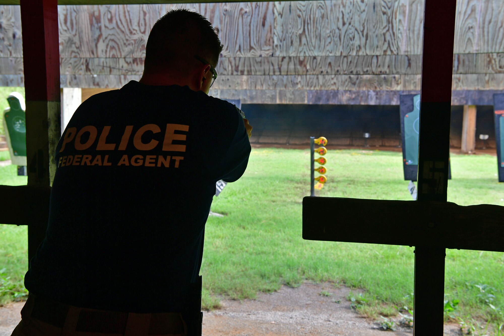 Special Agent Ciccgetto shoots at the range.