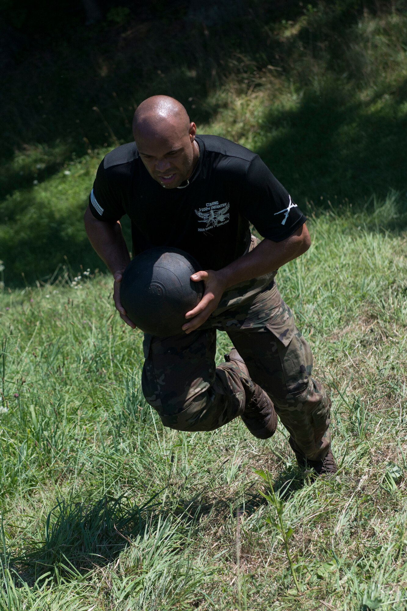 A Connecticut National Guardsman assigned to the 1-102nd Infantry Regiment competes in the physical training portion of the 15th Annual Connecticut SWAT Challenge in West Hartford, Conn., August 15, 2019. The Connecticut SWAT Challenge is a competition that tests the tactical skills of law enforcement officers. (Air National Guard photo by Tech. Sgt. Tamara R. Dabney)