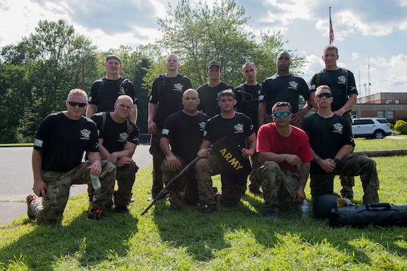 Connecticut National Guardsmen assigned to the 1-102nd Infantry Regiment pose for a photo after competing in the 15th Annual Connecticut SWAT Challenge in West Hartford, Conn., August 15, 2019. The Connecticut SWAT Challenge is a competition that tests the tactical skills of law enforcement officers. (Air National Guard photo by Tech. Sgt. Tamara R. Dabney)