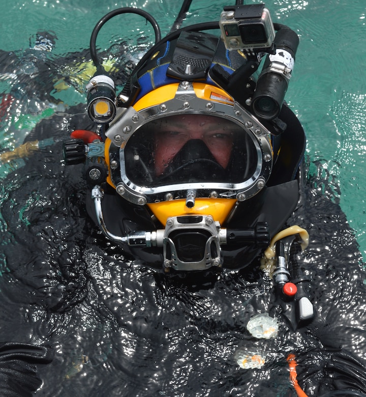 Steve England emerges after a dive during inspections at the  U.S. Army Garrison Kwajalein Atoll. England is a hydraulic engineer for the USACE Philadelphia District and serves on the USACE Forward Response Technical Dive Team. The dive team performs underwater inspections around the world on behalf of the Army’s Installation Management Command.