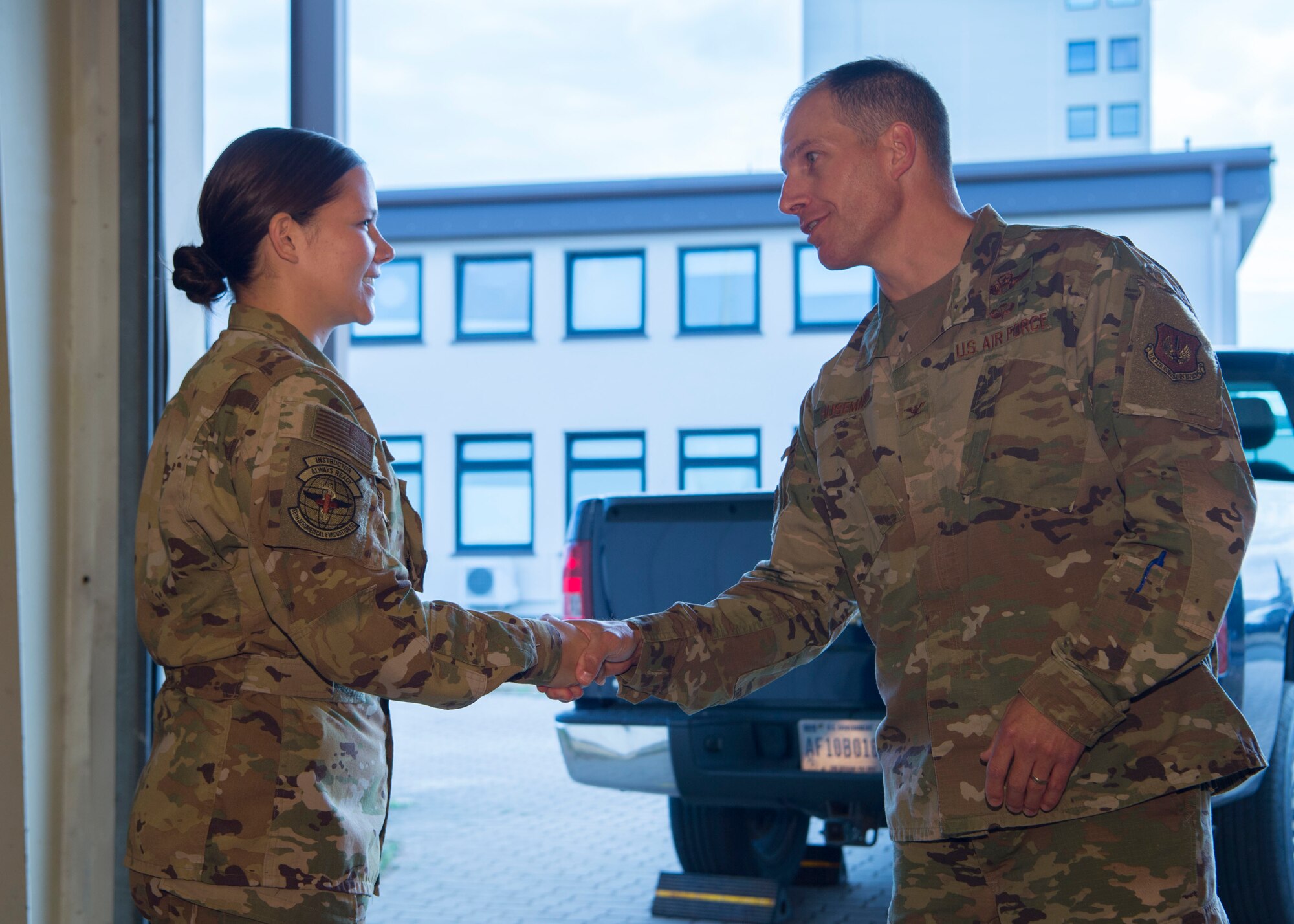 U.S. Air Force Col. Matthew S. Husemann, 86th
Airlift Wing vice commander, congratulates Tech.
Sgt. Christine Williams, 86th Aeromedical
Evacuation Squadron noncommissioned officer in
charge of aircrew training, on being named
Airlifter of the Week, at Ramstein Air Base,
Germany, Sept. 5, 2019.