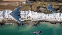 A U.S. Air Force B-2 Spirit, currently deployed to RAF Fairford in Gloucestershire, England, flies above the English countryside near Dover with two RAF F-35 jets, August 30, 2019. This is the first time UK F-35 Lightening jets have conducted training with the U.S. B-2 stealth bomber.