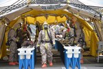 New York Army National Guard Soldiers of the Homeland Response Force for FEMA Region 2 provide decontamination for simulated victims during chemical, biological, radiological or nuclear (CBRN) incident response training at the New York State Preparedness Training Center in Oriskany, N.Y. September 7, 2019.