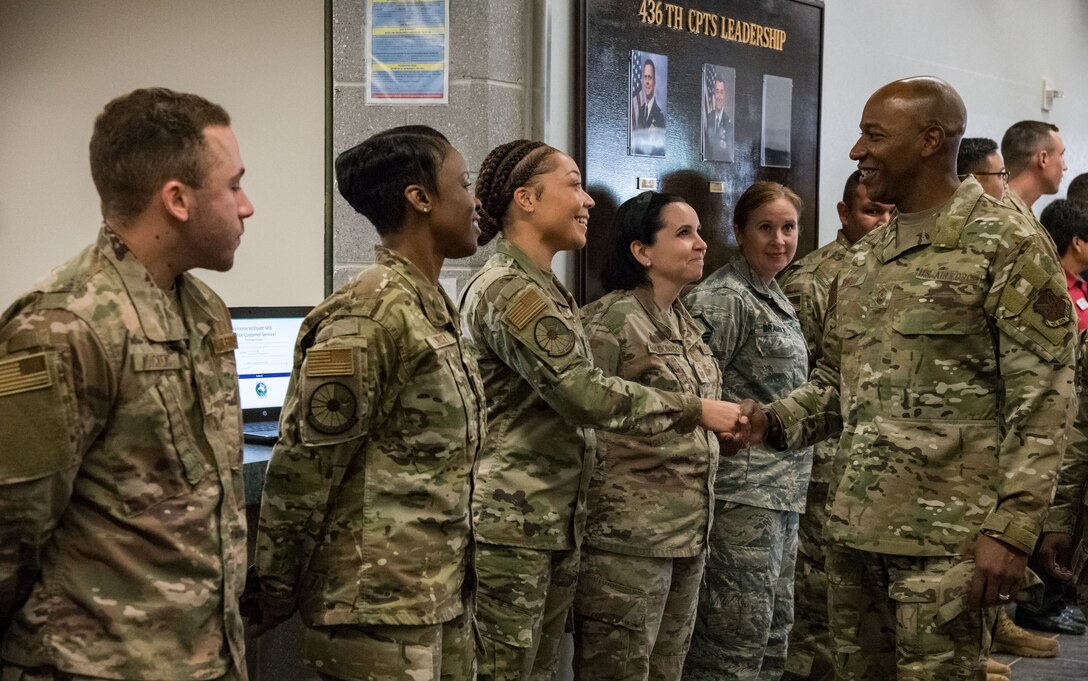 Chief Master Sgt. of the Air Force Kaleth O. Wright is greeted by Airmen from the 436th Force Support Squadron Sept. 3, 2019, at Dover Air Force Base, Del. Wright visited several units on base including aircrew flight equipment and the medical group. (U.S. Air Force photo by Roland Balik)