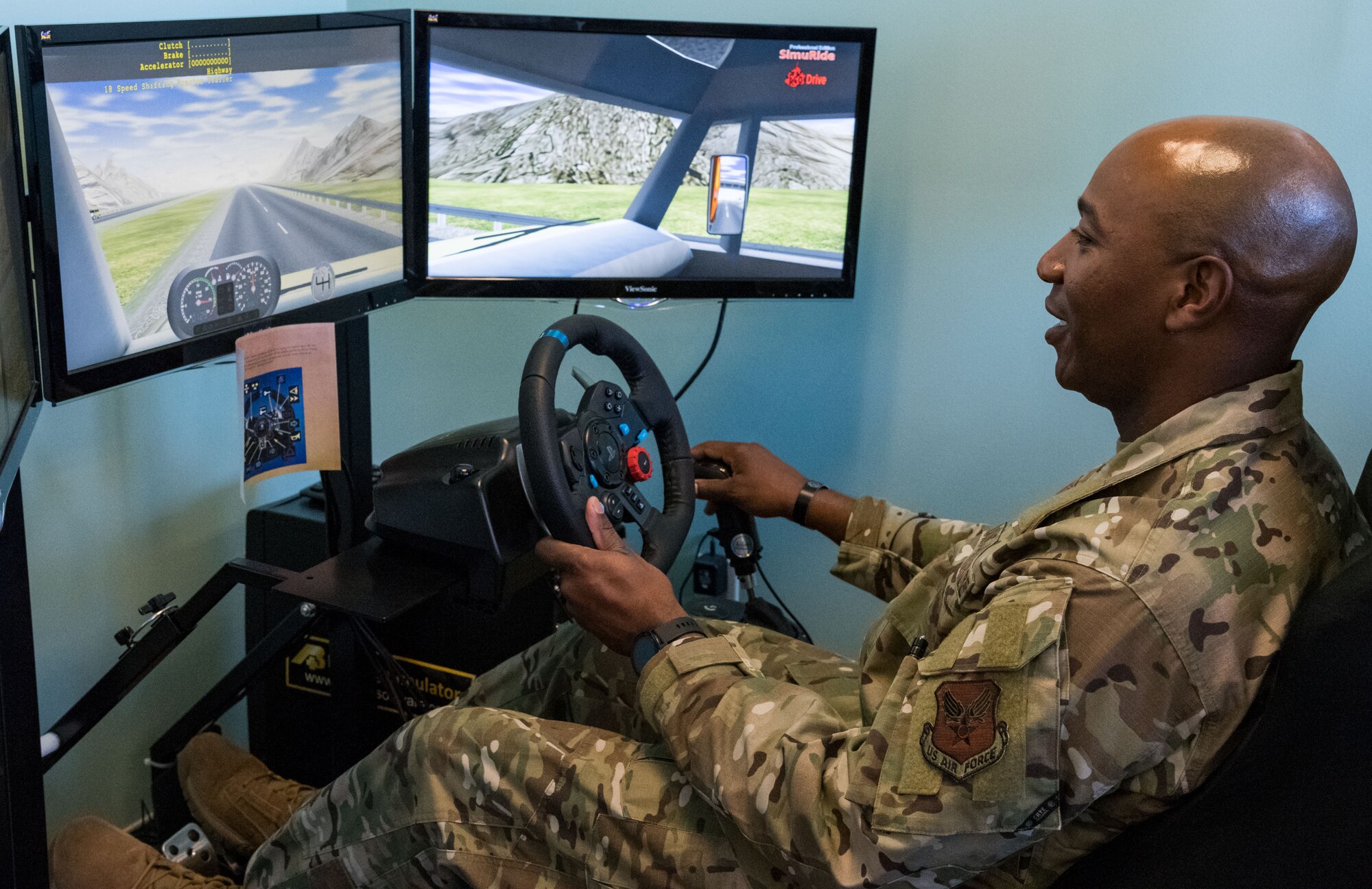 Chief Master Sgt. of the Air Force Kaleth O. Wright operates a semitruck driving simulator Sept. 3, 2019, at Dover Air Force Base, Del. Wright learned of the difficulties with maneuvering large vehicles and the importance of having licensed and certified drivers in the Air Force. (U.S. Air Force photo by Roland Balik)