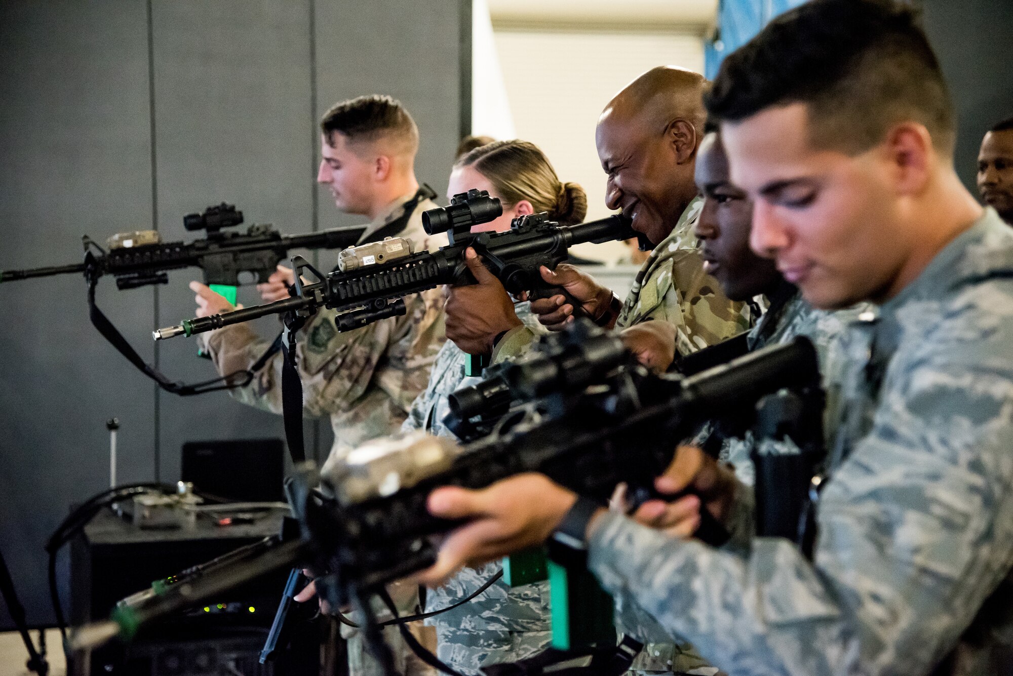 Chief Master Sgt. of the Air Force Kaleth O. Wright participates in a security forces simulator exercise with members of the 436th Security Forces Squadron at Dover Air Force Base, Delaware, September 3, 2019. The security forces visit was a part of a two-day tour of Dover AFB. (U.S. Air Force photo by Staff Sgt. Damien Taylor)