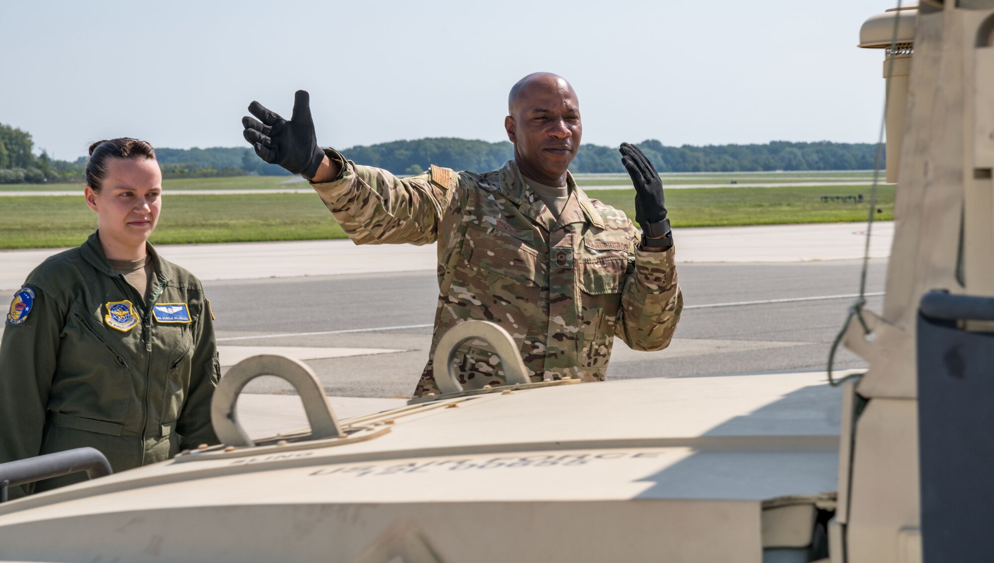 Chief Master Sgt. of the Air Force Kaleth O. Wright participates in a C-17A Globemaster III Humvee off-load with Senior Airman Daniele Belovarac, 3rd Airlift Squadron loadmaster, Sept. 4, 2019, at Dover Air Force Base, Del. Wright visited aircrew members and maintenance personnel during a two-day visit. (U.S. Air Force photo by Roland Balik)
