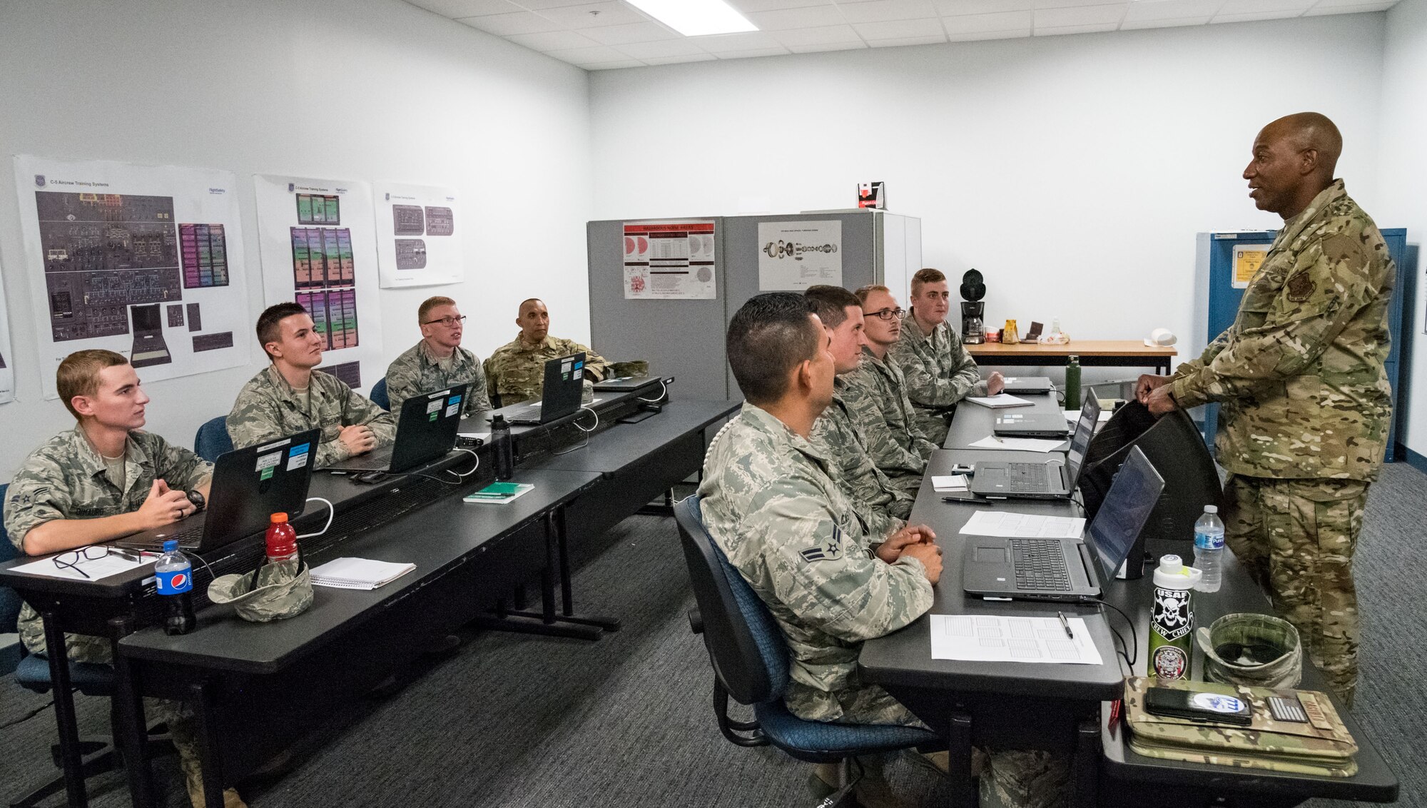 Chief Master Sgt. of the Air Force Kaleth O. Wright talks with Airmen from  Detachment 3, 373rd Training Squadron, Sept. 4, 2019, at Dover Air Force Base, Del. Wright shared stories and provided top-level support to Dover Airmen for their continued excellence. (U.S. Air Force photo by Roland Balik)