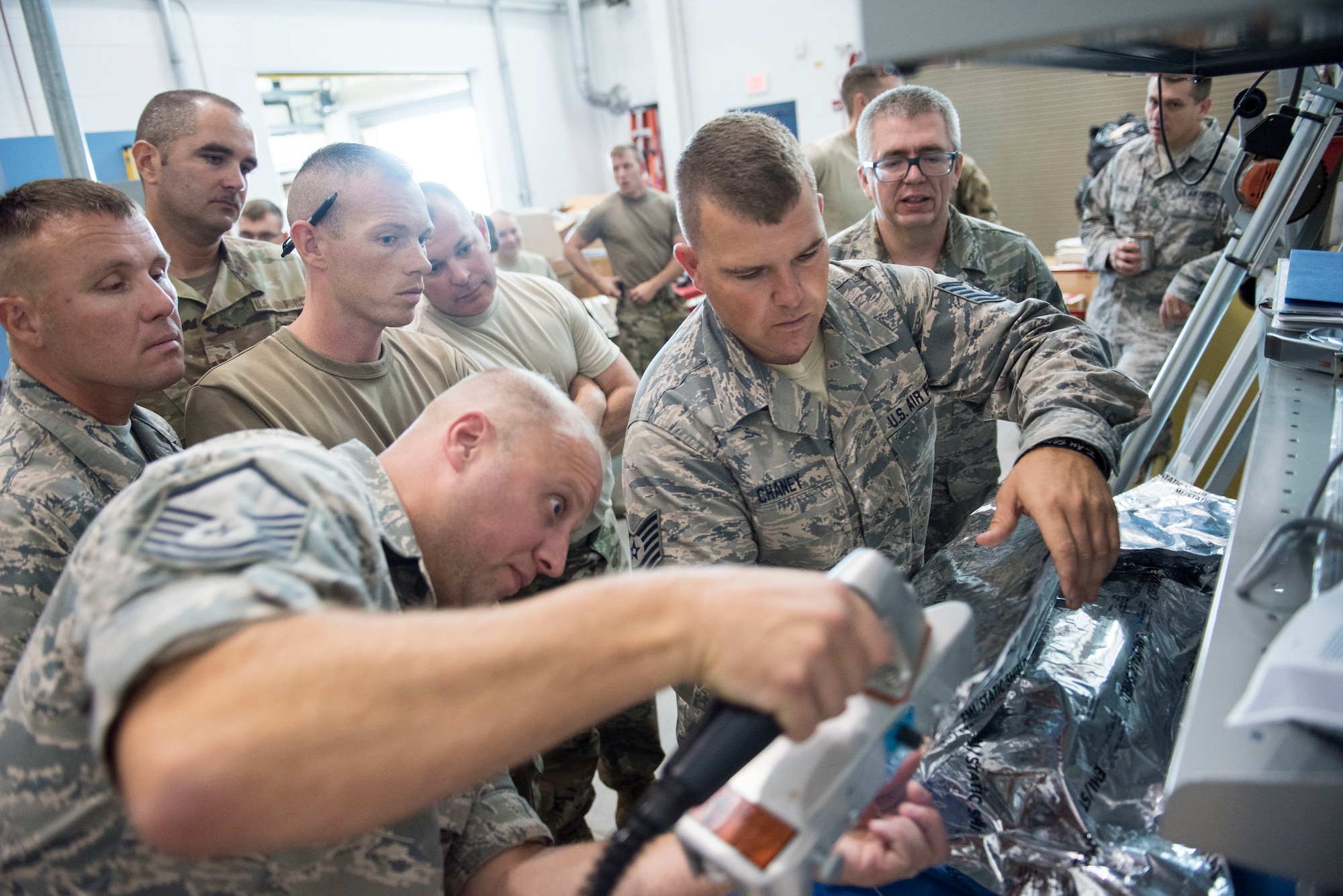 167th Airlift Wing aircraft maintainers, Master Sgt. David Miller, Tech. Sgt. Corey Chaney and Master Sgt. Michael Bowman demonstrate proper packing procedures for electrostatic discharge sensitive aircraft parts to 167th Logistics Readiness Squadron Airmen, Sept. 5, 2019. Airmen assigned to the 167th Airlift Wing helped reset the Air Force program that guides the packing procedures. (U.S. Air National Guard photo by Senior Master Sgt. Emily Beightol-Deyerle)