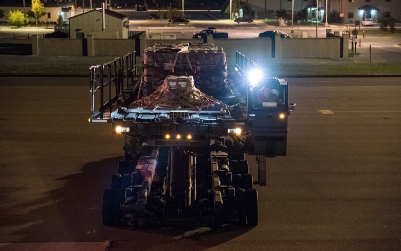 A K-loader with five pallets driven by a 436th Aerial Port Squadron ramp services specialist, slowly moves into position by the cargo door of an Air Transport International Boeing 757-200 Sept. 8, 2019, at Dover Air Force Base, Del. The ATI aircraft, part of the Civil Reserve Air Fleet program, was contracted to transport cargo pallets and 30 Team Dover members to Fairchild AFB, Wash., participating in Mobility Guardian 2019. “We welcome the inclusion of one of our CRAF partners in MG19 as it marks the first time Air Mobility Command has exercised a commercial airlift component of our wartime plan,” said Maj. Adam Crane, AMC Headquarters CRAF Branch Chief, Scott AFB, Ill. (U.S. Air Force photo by Roland Balik)