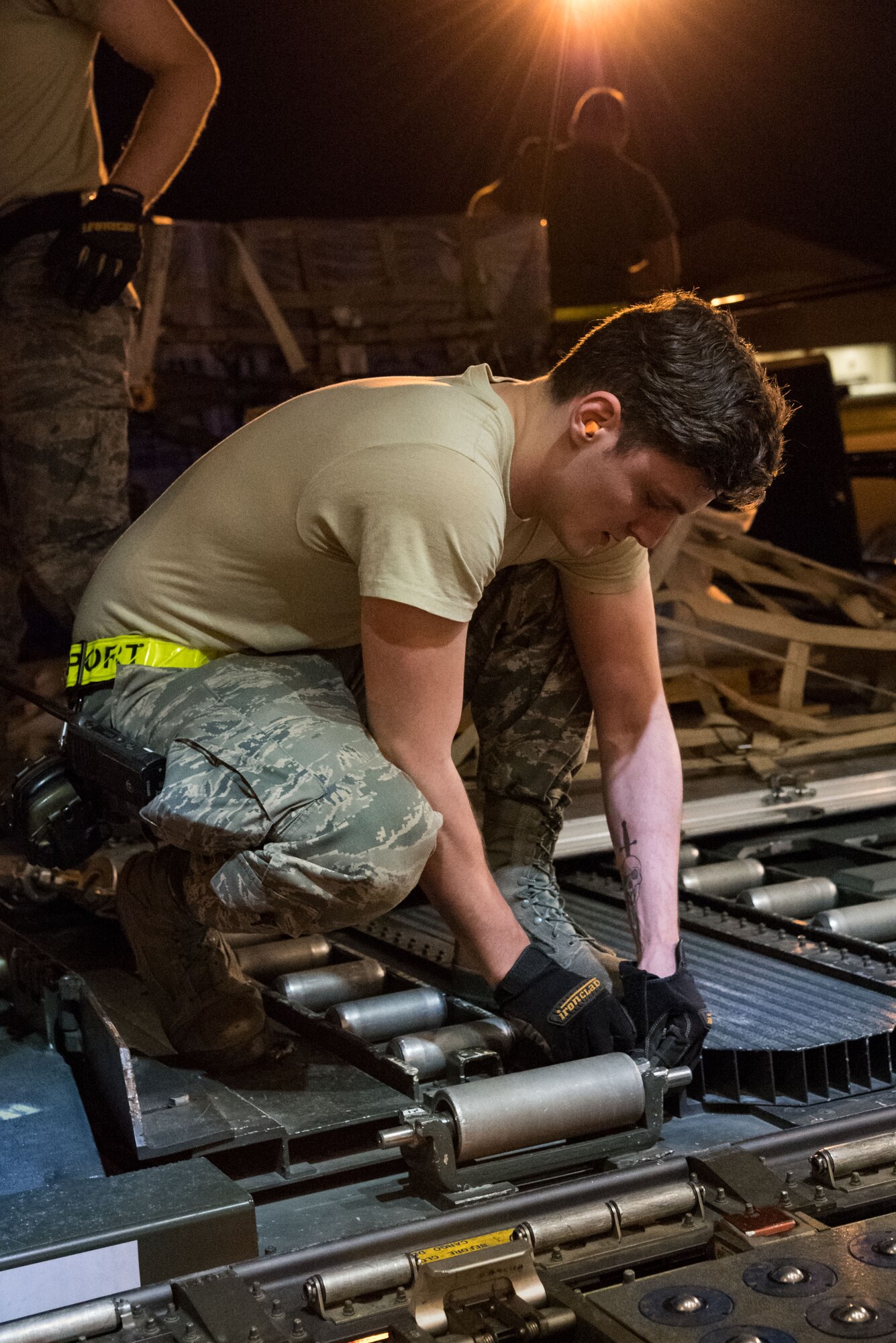 Senior Airman Brandon Sanderell, 436th Aerial Port Squadron ramp services specialist, configures a cargo roller Sept. 8, 2019, at Dover Air Force Base, Del. The Air Transport International Boeing 757-200 aircraft, part of the Civil Reserve Air Fleet program, was contracted to transport cargo and 30 Team Dover personnel to Fairchild AFB, Wash., participating in Mobility Guardian 2019. “In support of exercise Mobility Guardian 2019, Air Mobility Command contracted commercial aircraft to simulate activating CRAF marking the first time, in a long time, AMC has exercised a commercial component of its wartime plan,” said Maj. Adam Crane, AMC Headquarters CRAF Branch Chief, Scott AFB, Ill. (U.S. Air Force photo by Roland Balik)