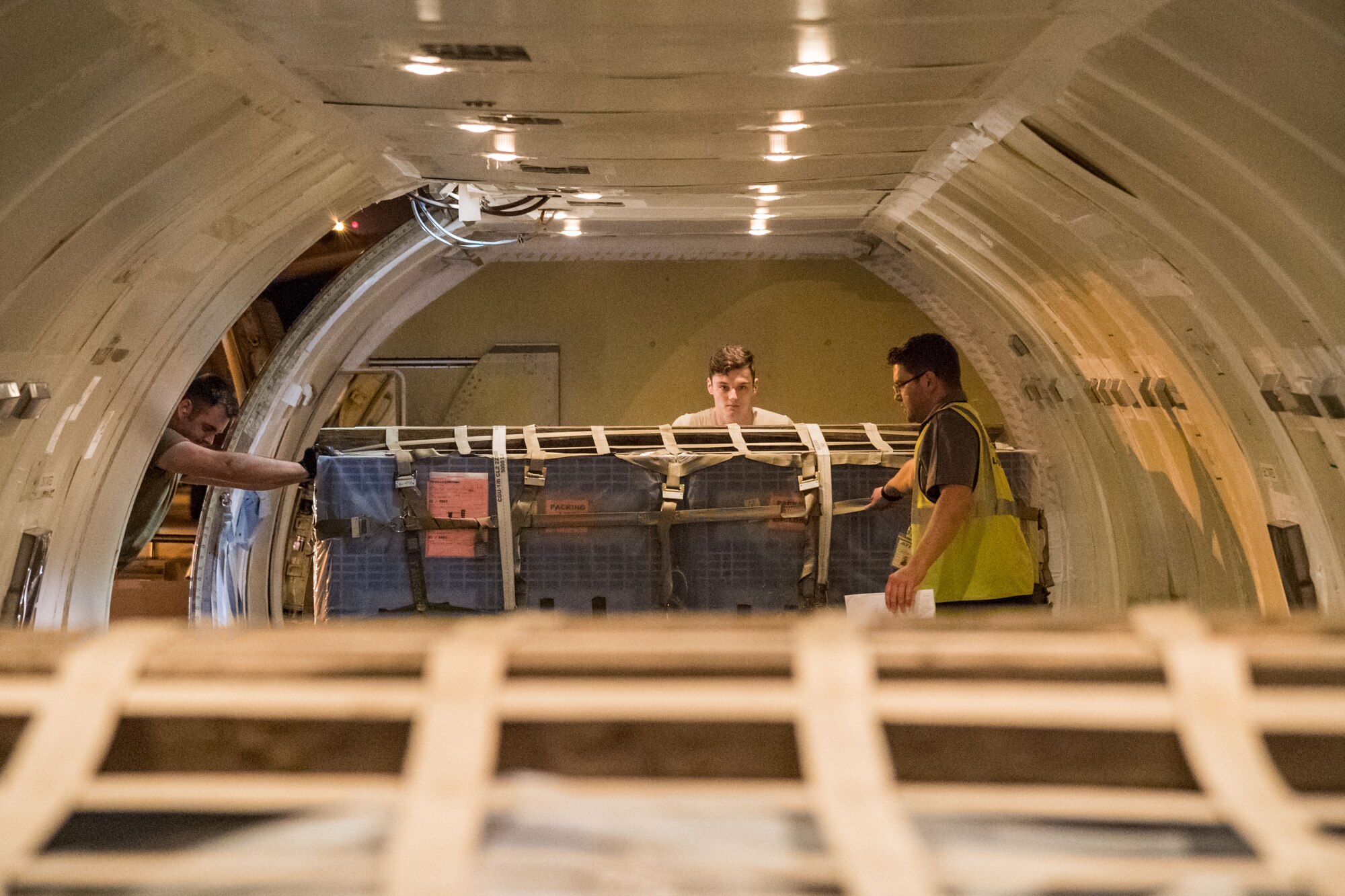 Brian McDonald, Air Transport International senior loadmaster, watches a pallet being loaded Sept. 8, 2019, at Dover Air Force Base, Del. The ATI aircraft, part of the Civil Reserve Air Fleet program, was contracted to transport cargo and 30 Team Dover members to Fairchild AFB, Wash., participating in Mobility Guardian 2019. “This mission is multidimensional and will provide a greater understanding of the commercial airlift capabilities and requirements across Air Mobility Command and the commercial airlift enterprise,” said Maj. Adam Crane, AMC Headquarters CRAF Branch Chief, Scott AFB, Ill. (U.S. Air Force photo by Roland Balik)